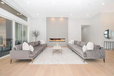 A bright, staged living room in a listed home