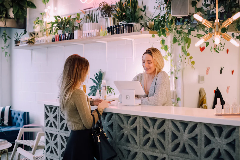 A customer being served at a shop counter