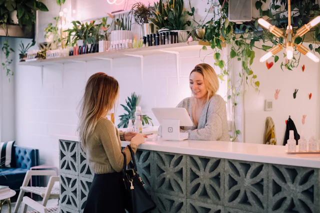A customer being served at a shop counter
